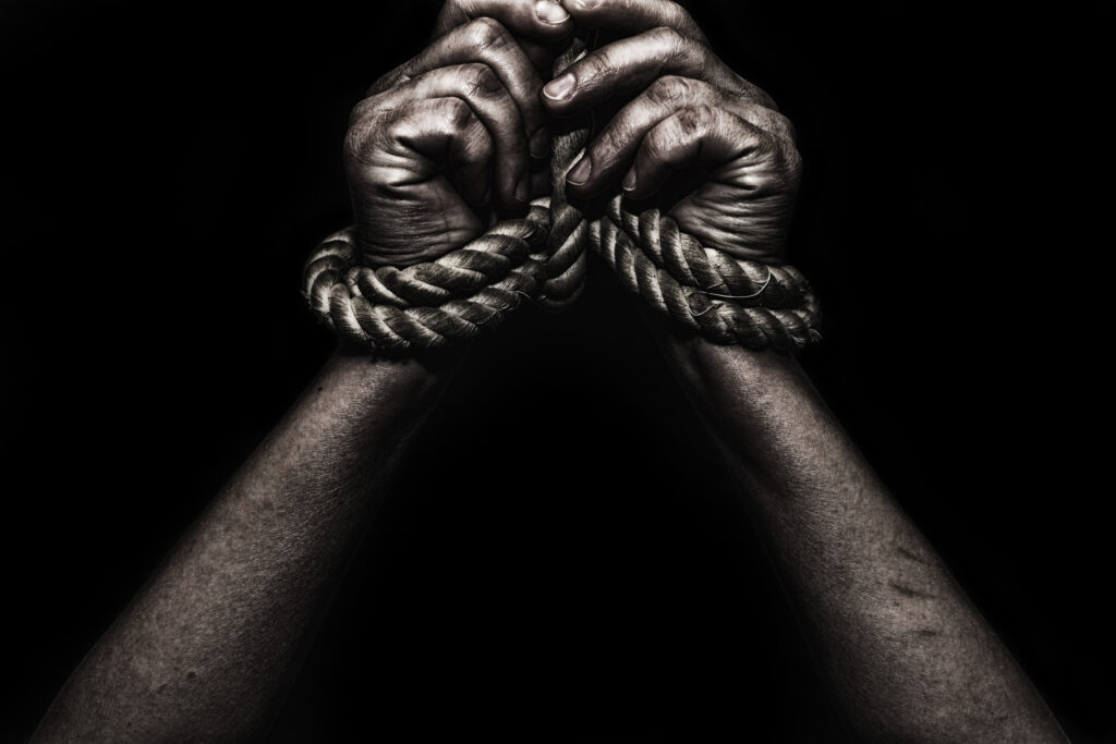 Human Trafficking: From ANCIENT Slavery to Contemporary Exile woman,hands,bound,prisoner,in,room,hands,bound
